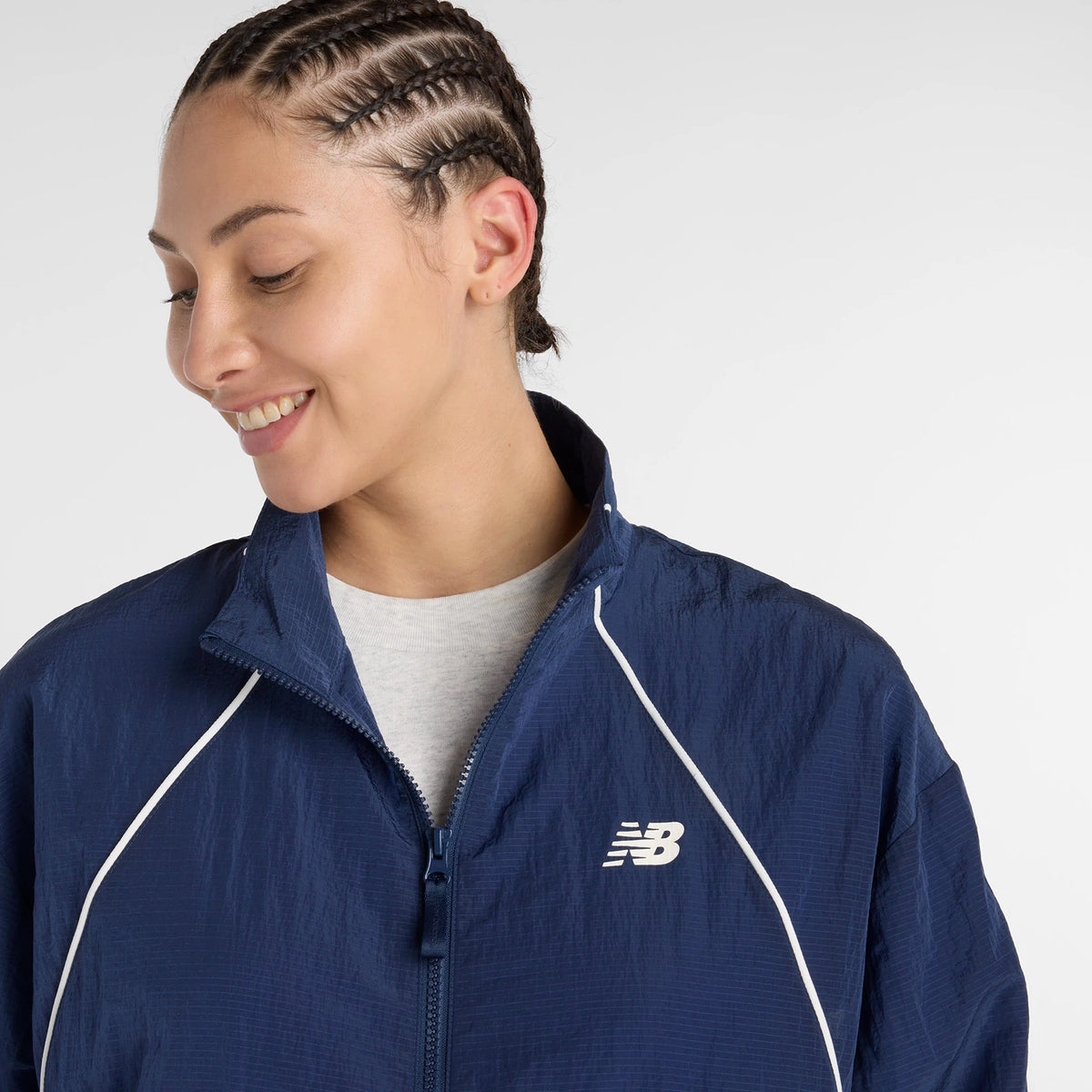 NEW BALANCE Sport Legacy Jacket: blau jaqueta per a dona