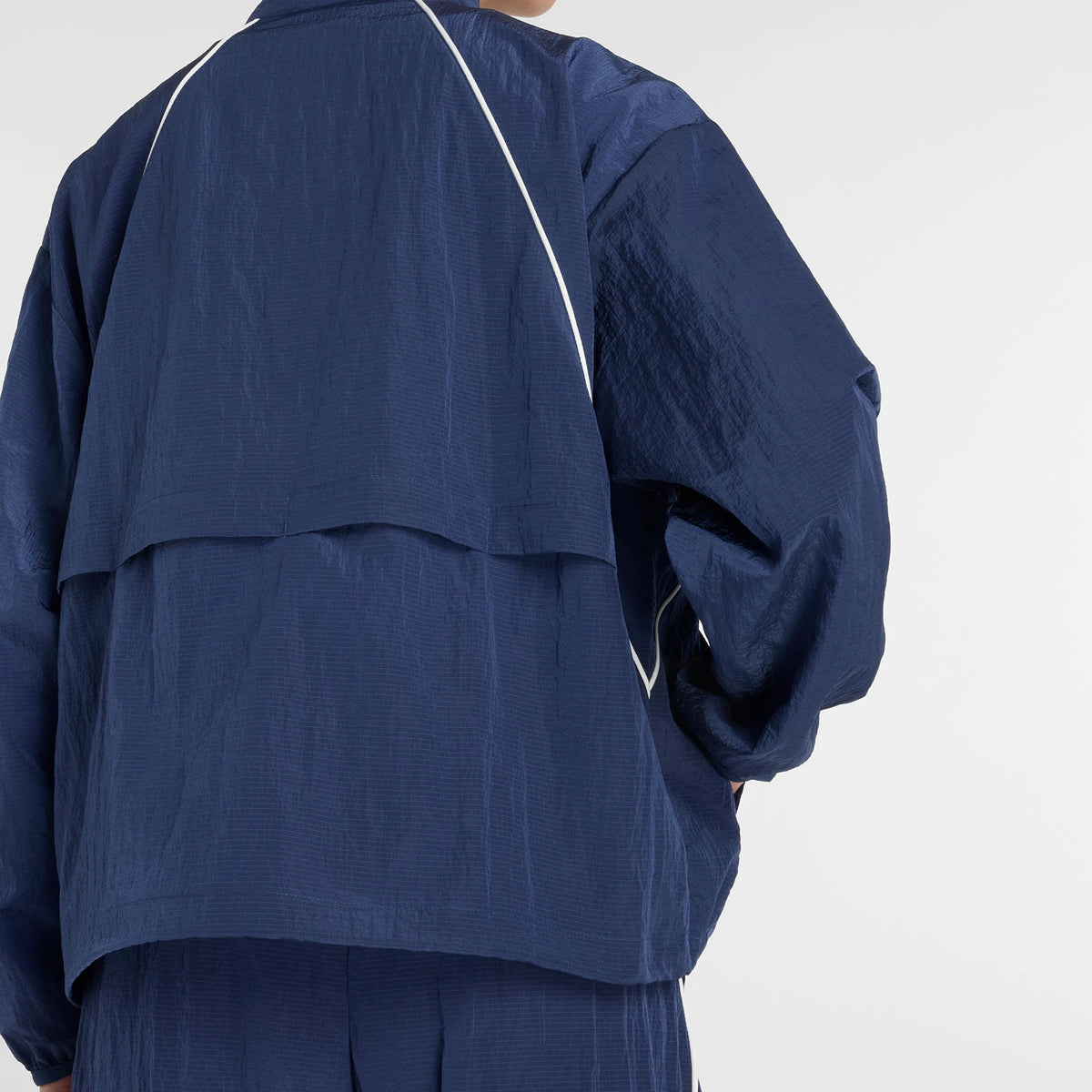 NEW BALANCE Sport Legacy Jacket: blau jaqueta per a dona